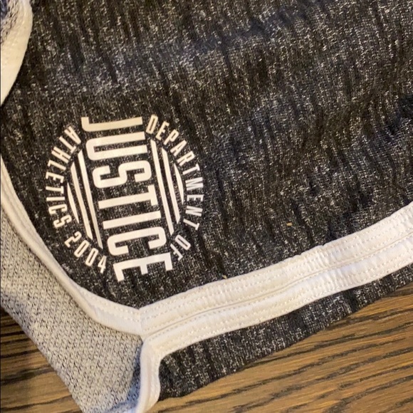 2 pairs of black shorts and 1 pair of blue shorts. - Picture 2 of 8